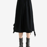 Black skirt worn by a person, showing the skirt's fit