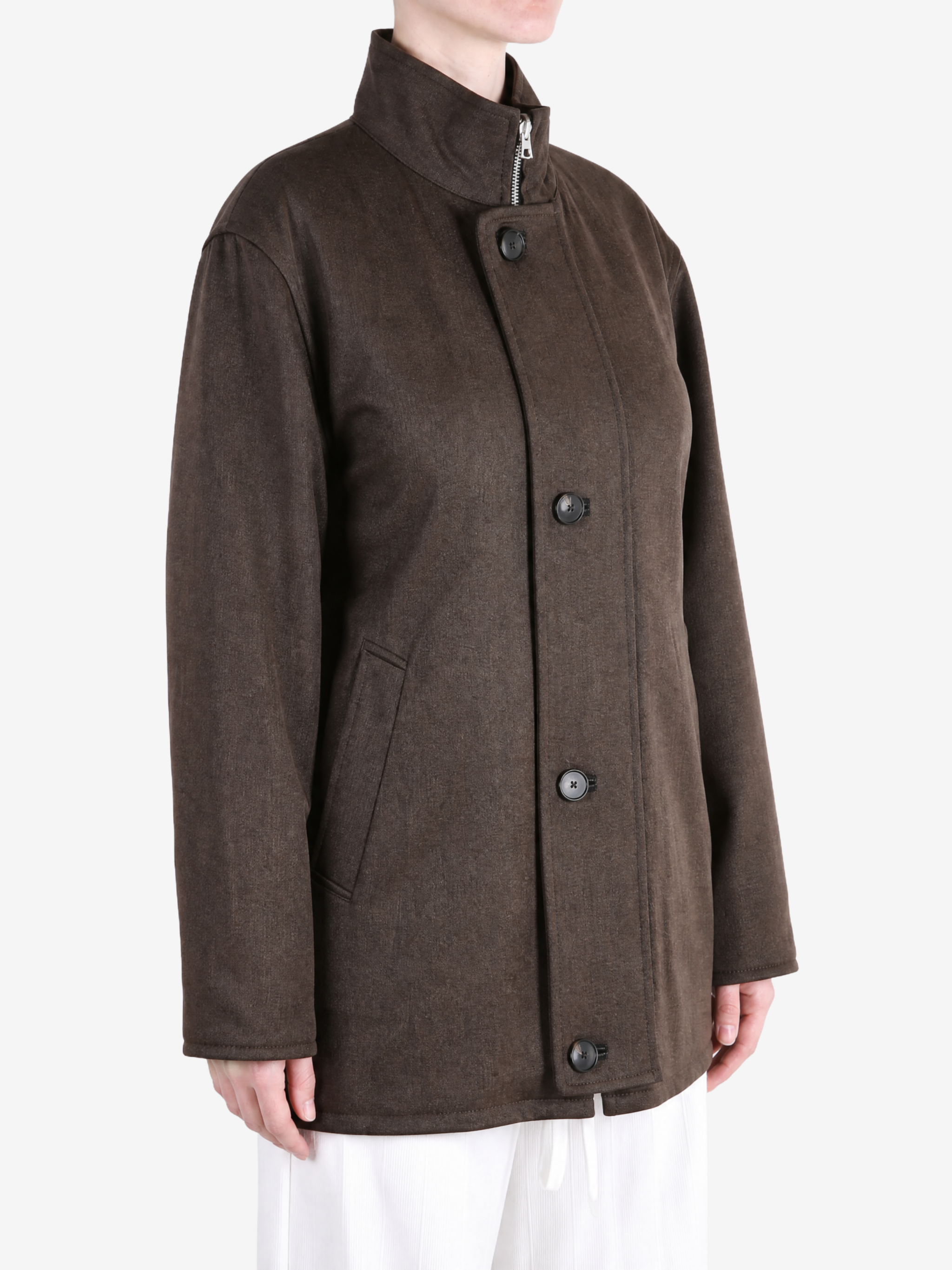Brown jacket worn by a person, showing the jacket fit