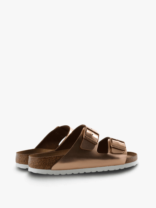 Tan sandals, side view
