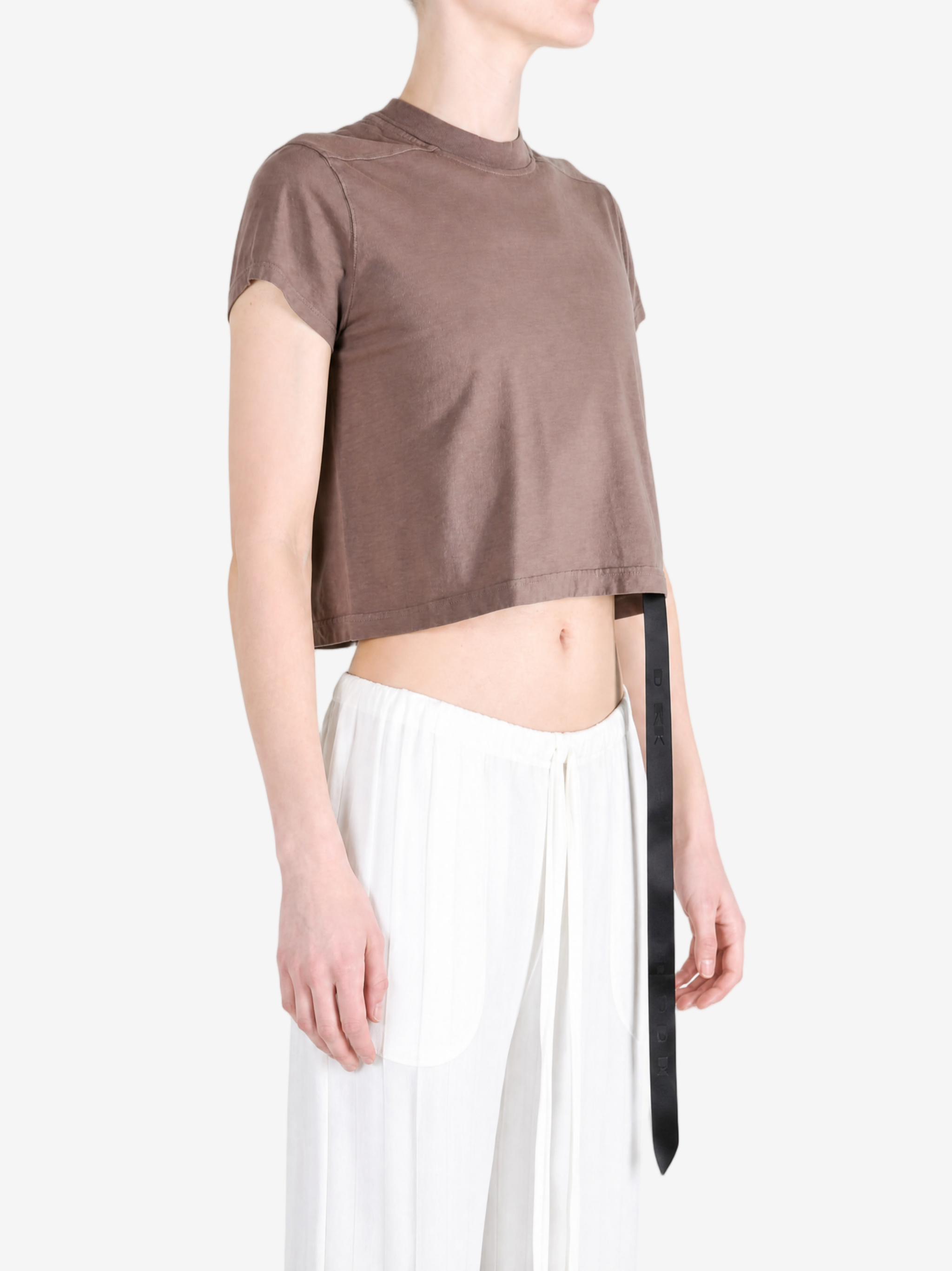 Brown t-shirt worn by a person, showing the t-shirt fit