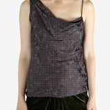 Brown top worn by a person, showing the top's fit