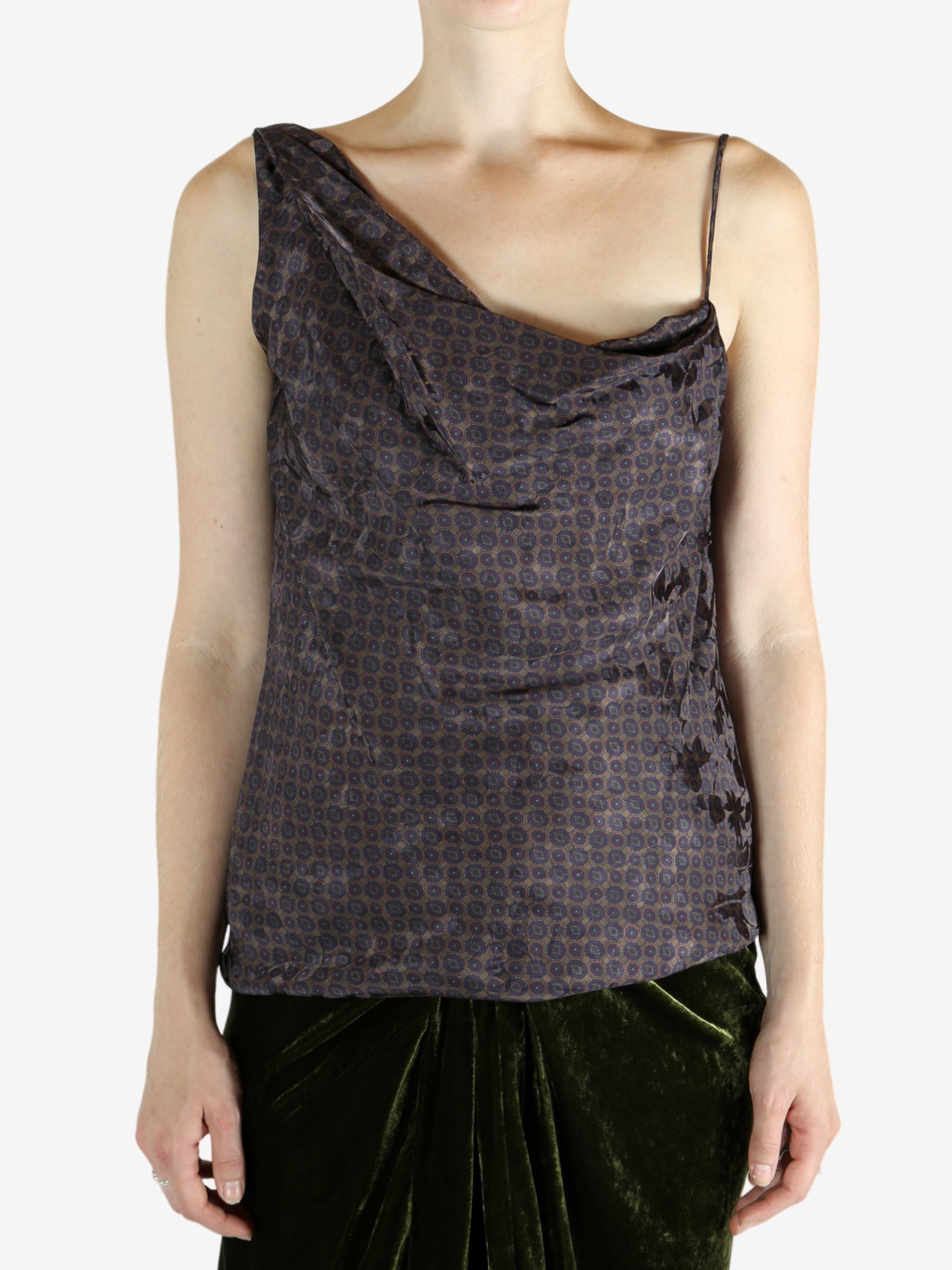 Brown top worn by a person, showing the top's fit