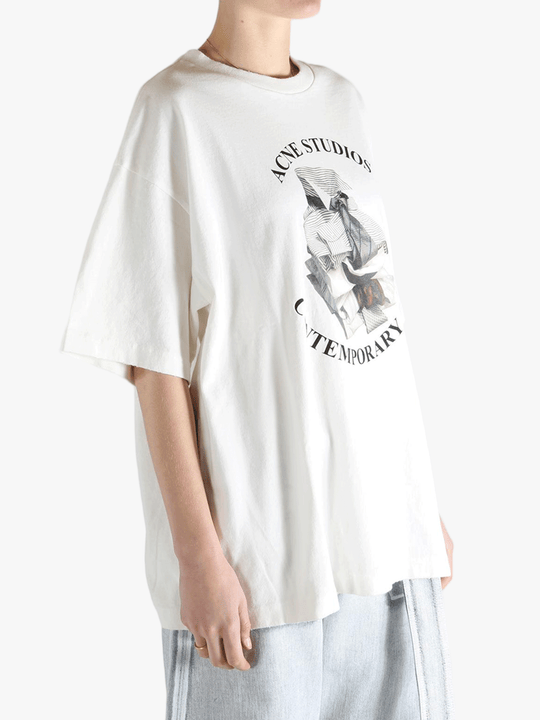 White t-shirt worn by a person, showing the t-shirt's fit