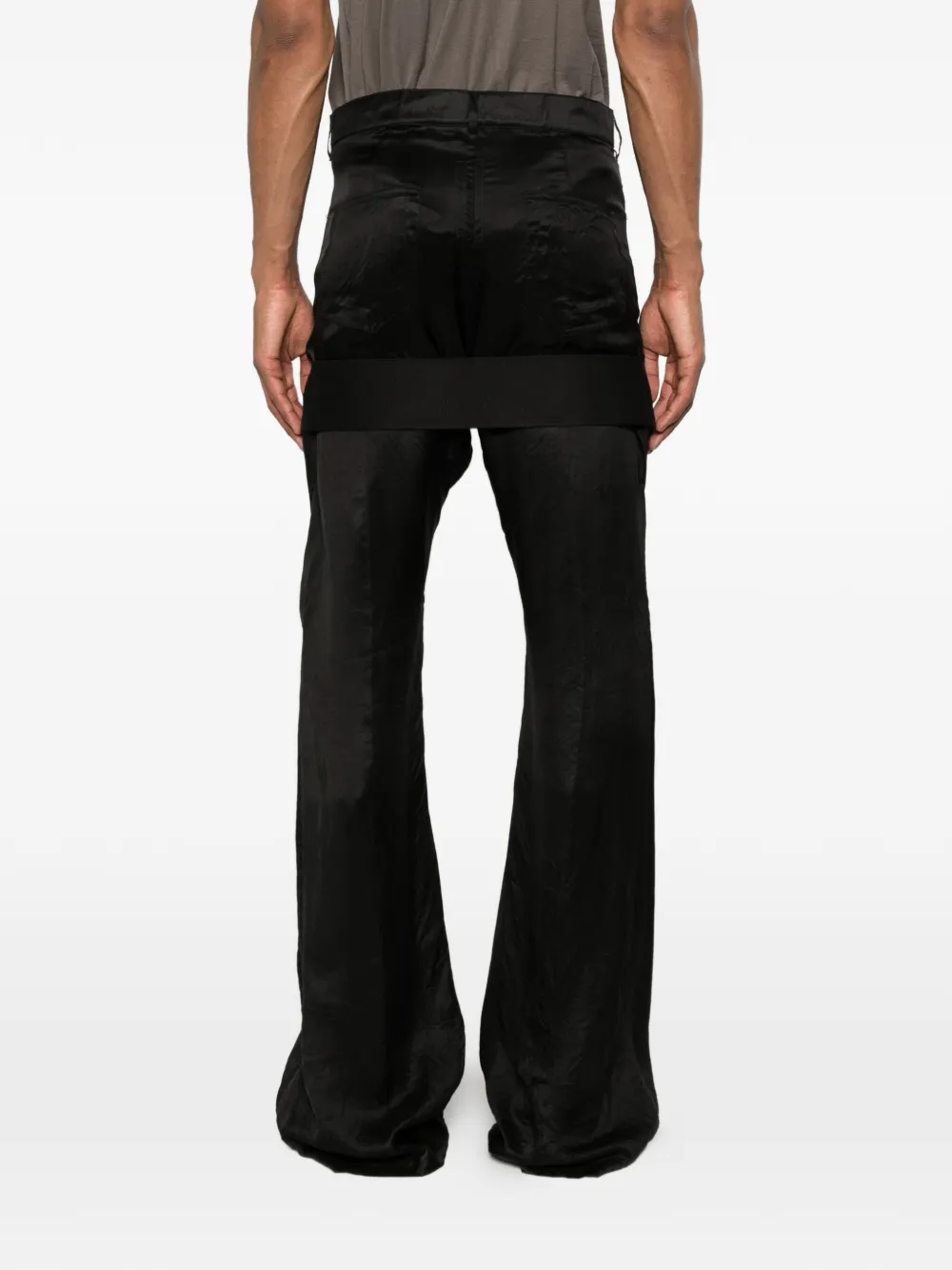 Black pant worn by a person, showing the pant fit