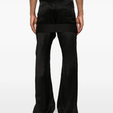 Black pant worn by a person, showing the pant fit
