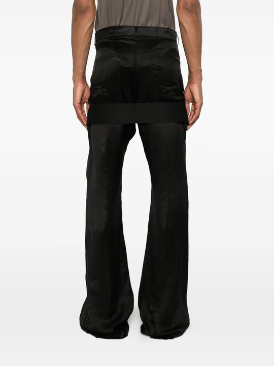 Black pant worn by a person, showing the pant fit