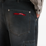 Black pants,showing texture of the cowboy fabric