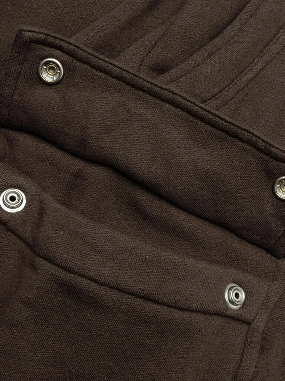 Close up of brown shorts,showing texture of the cotton fabric