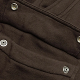 Close up of brown shorts,showing texture of the cotton fabric