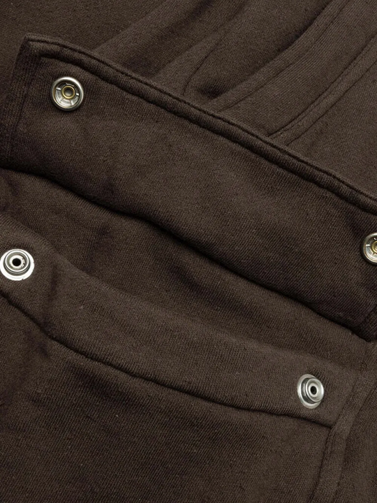 Close up of brown shorts,showing texture of the cotton fabric