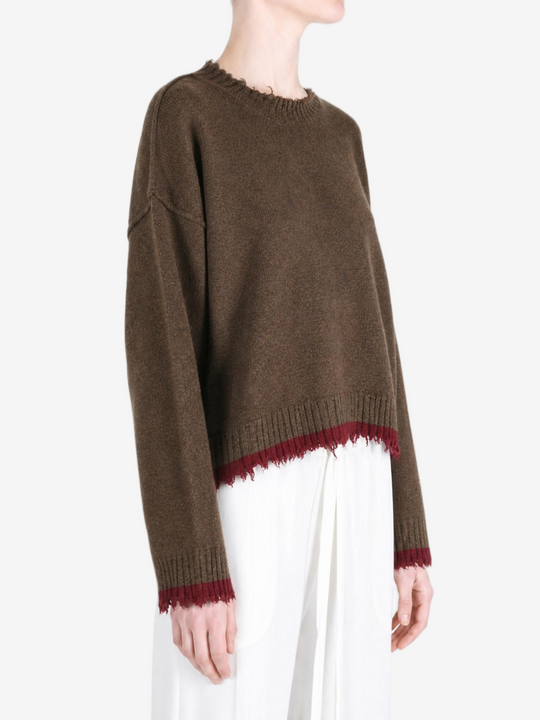 Brown top worn by a person, showing the top fit