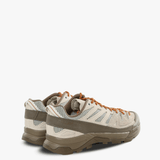 Tan sneakers, back view