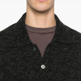 Close up of grey shirt, showing texture of the Alpaca Wool fabric