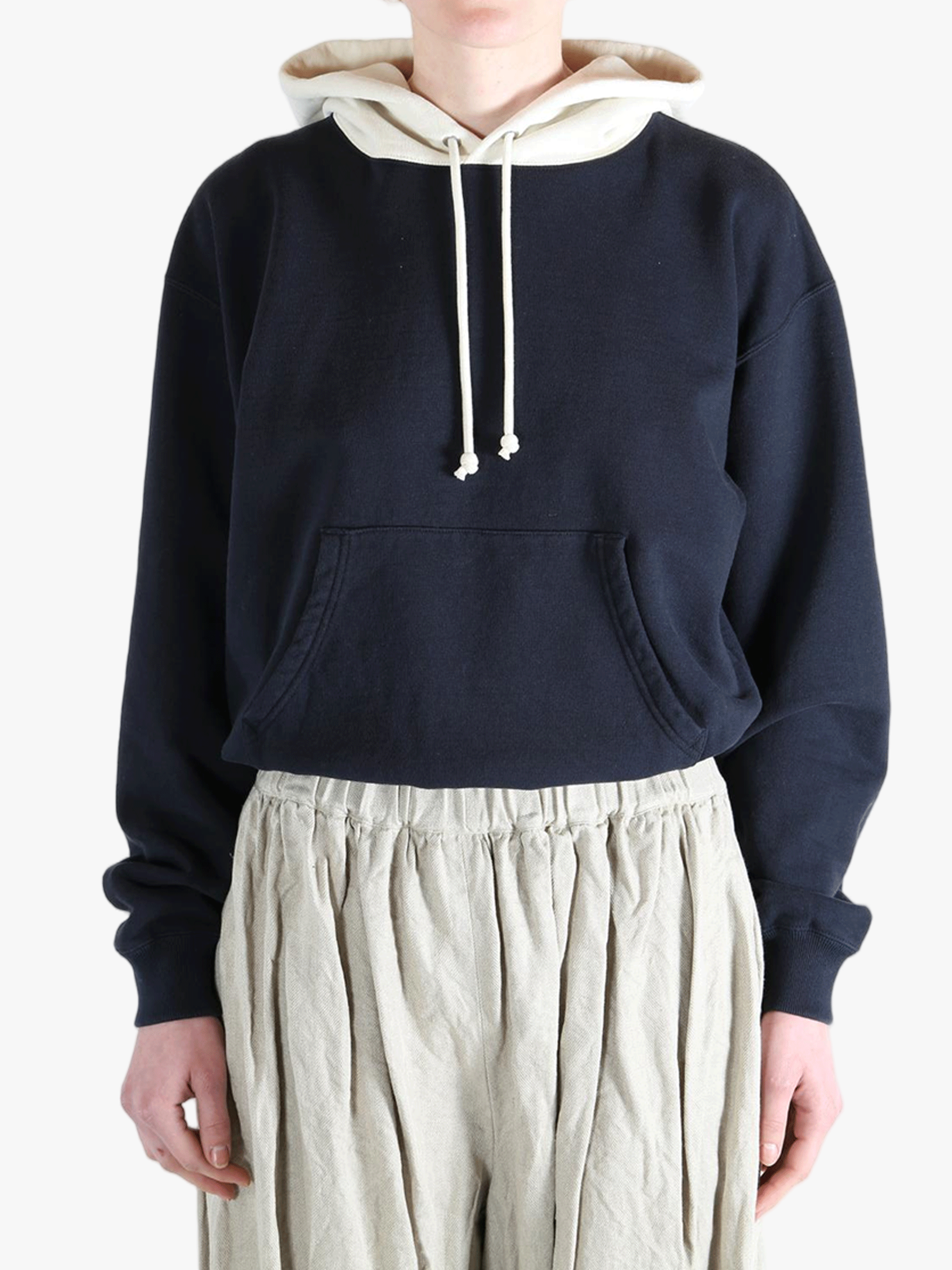 Navy parka worn by a person, showing the parka's fit