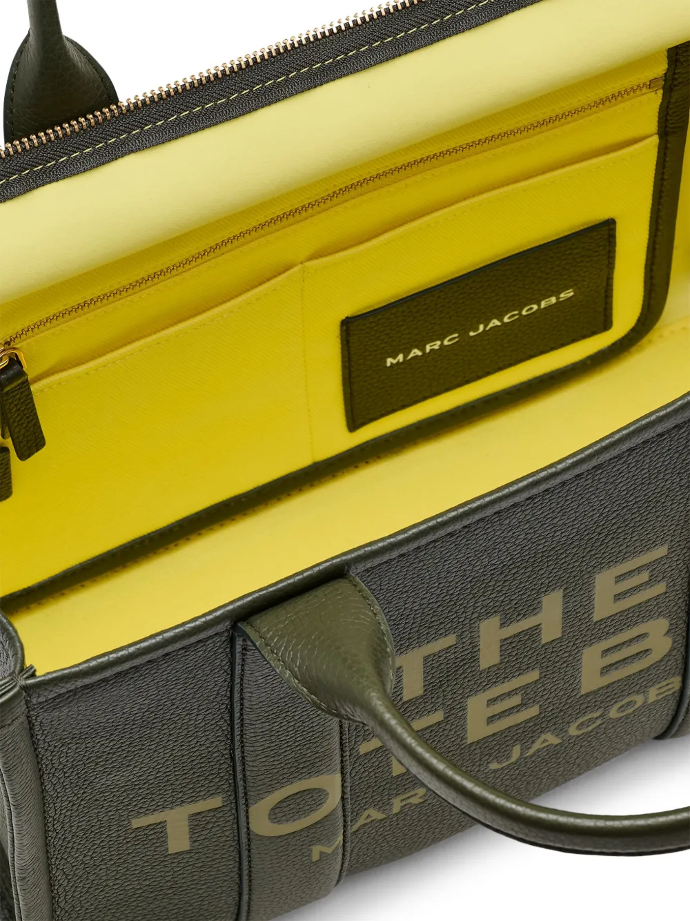 Close up of green bags,showing texture of the leather fabric.