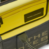 Close up of green bags,showing texture of the leather fabric.