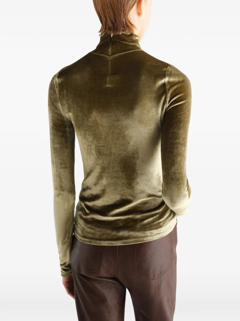 Green top worn by a person, showing the top fit