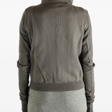 Grey sweat worn by a person, showing the sweat fit