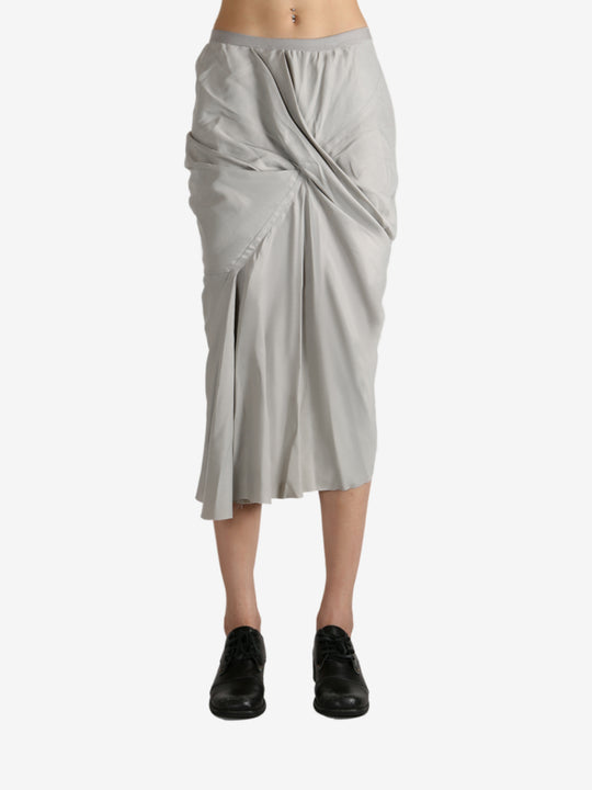 Grey skirt worn by a person, showing the skirt's fit