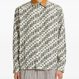 white shirt worn by a person, showing the shirt fit