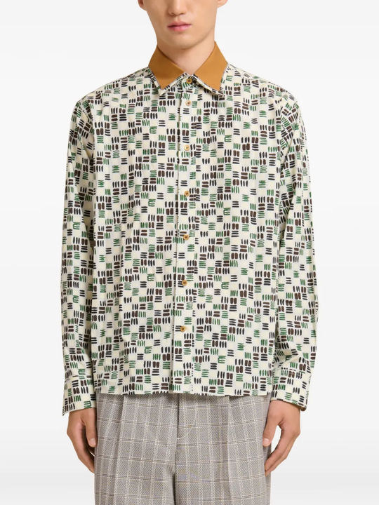 white shirt worn by a person, showing the shirt fit