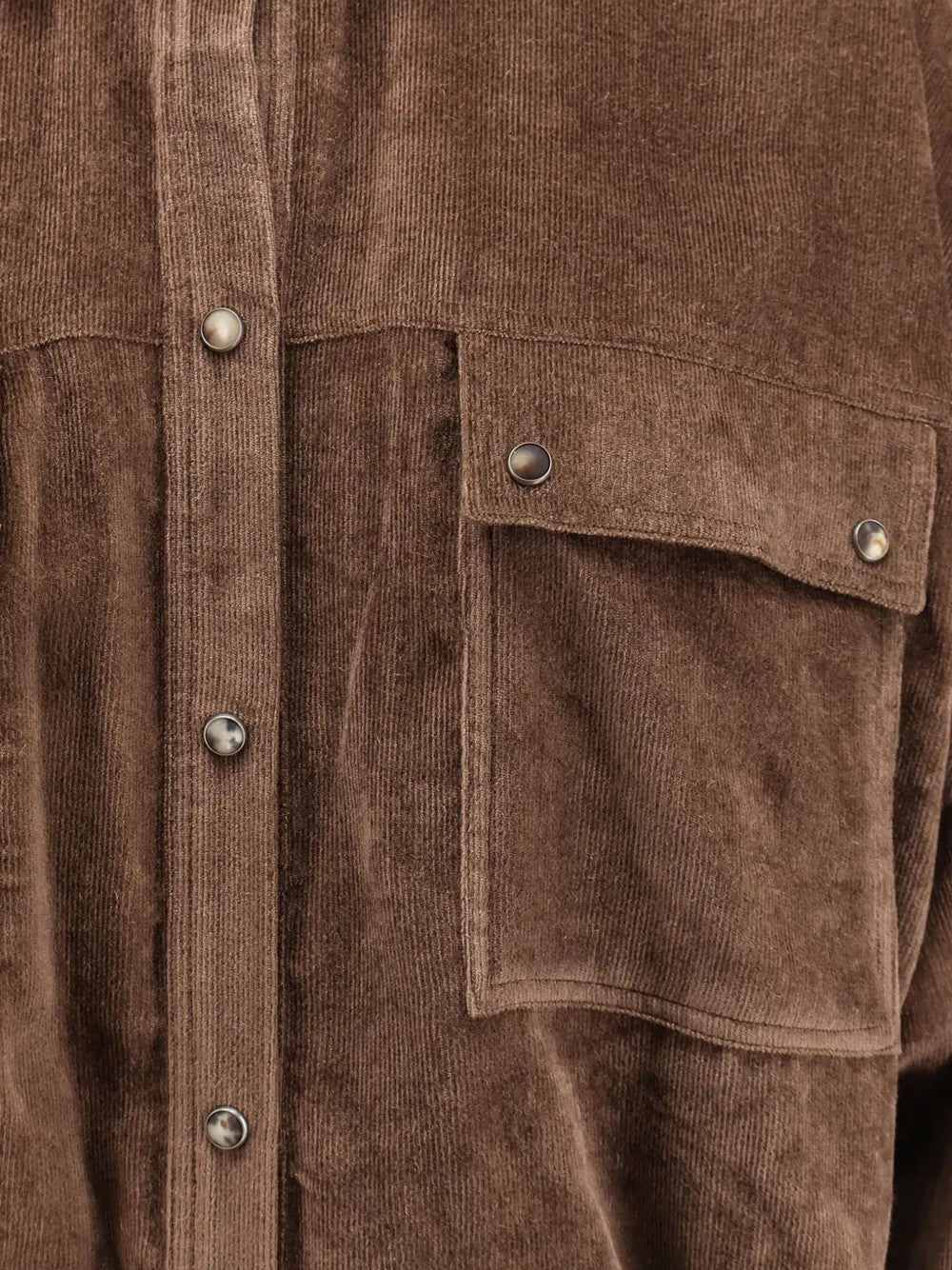 Close up of Brown shirt, showing texture of the 93% viscose/ 7% cashmere fabric