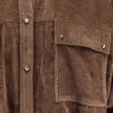 Close up of Brown shirt, showing texture of the 93% viscose/ 7% cashmere fabric