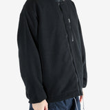 Black jacket worn by a person, showing the jacket's fit