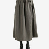 Grey skirt worn by a person, showing the skirt fit