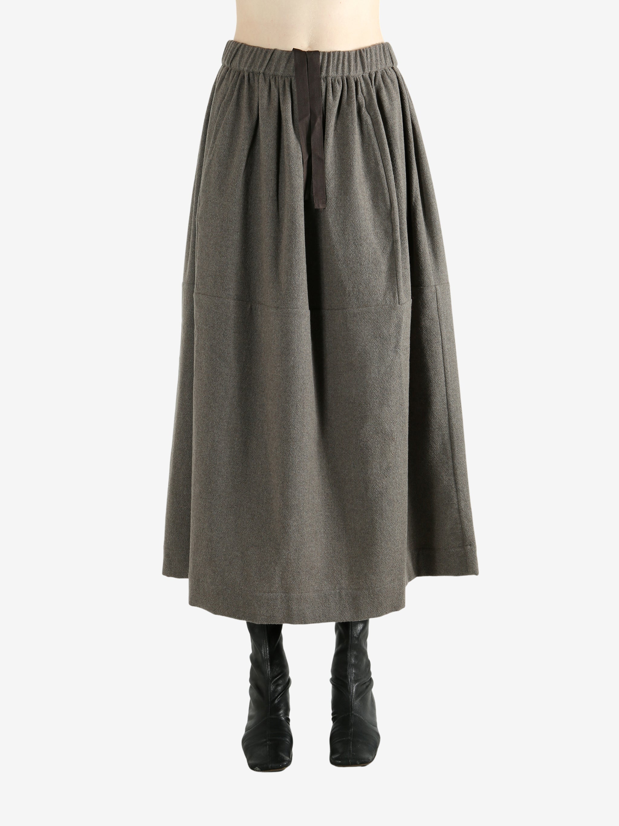 Grey skirt worn by a person, showing the skirt fit