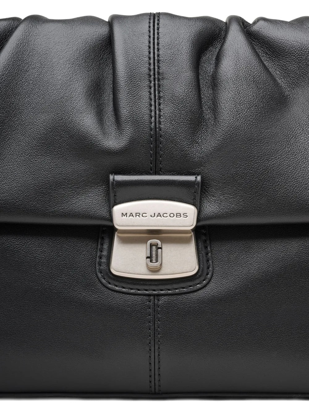 Close up of the black bag, showing texture of the leather fabric