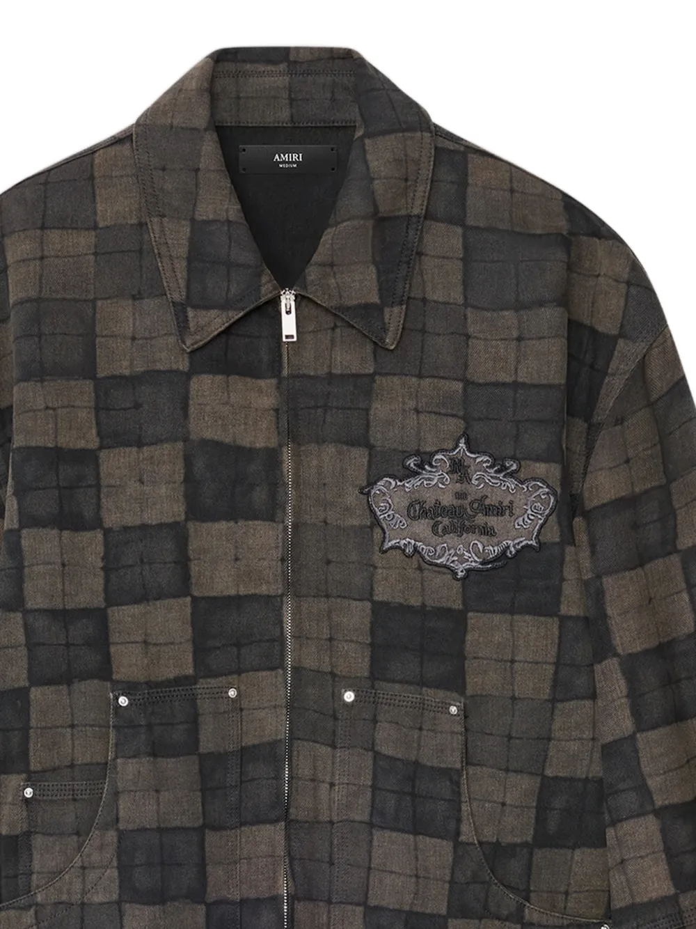 close up of brown jackets-coats, showing texture of the cotton fabric