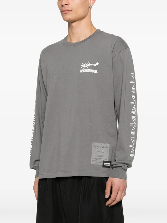 Grey t-shirt worn by a person, showing the t-shirt's fit