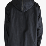 Black jackets worn by a person, showing the jackets fit