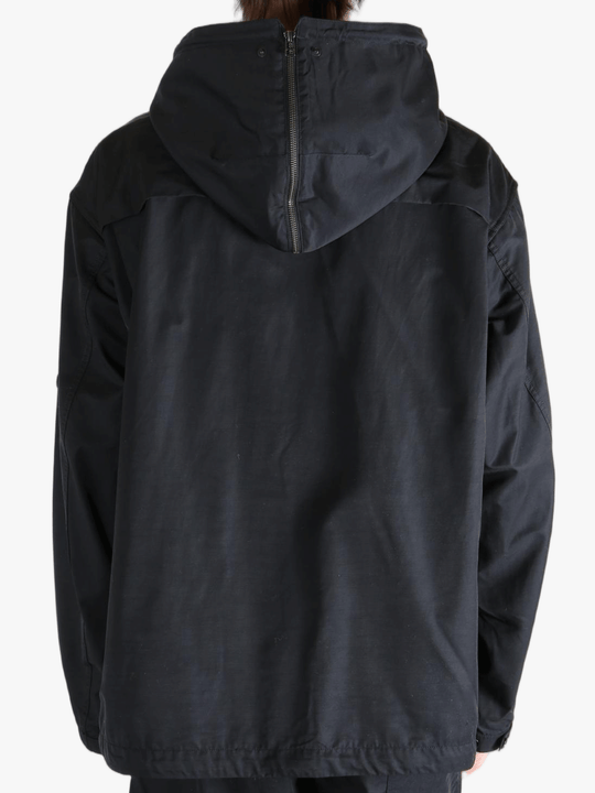 Black jackets worn by a person, showing the jackets fit