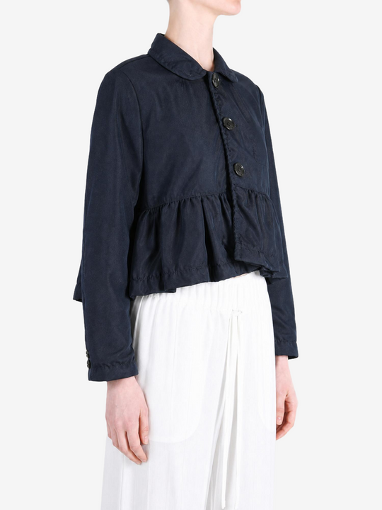 Navy jacket worn by a person, showing the jacket fit