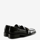 Black loafers, back view