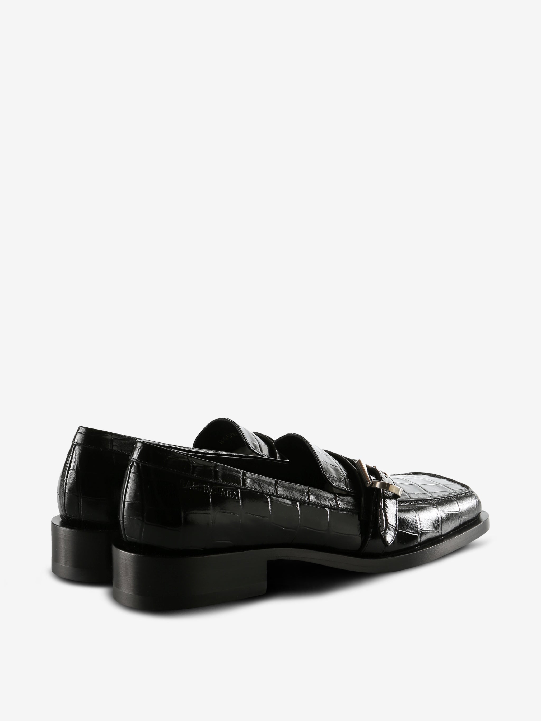 Black loafers, back view