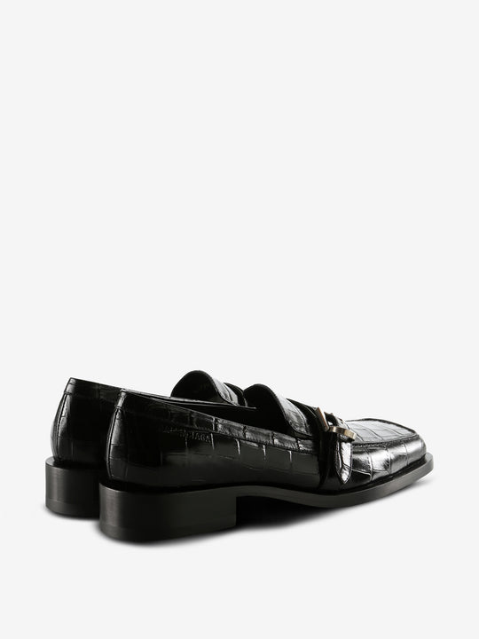 Black loafers, back view