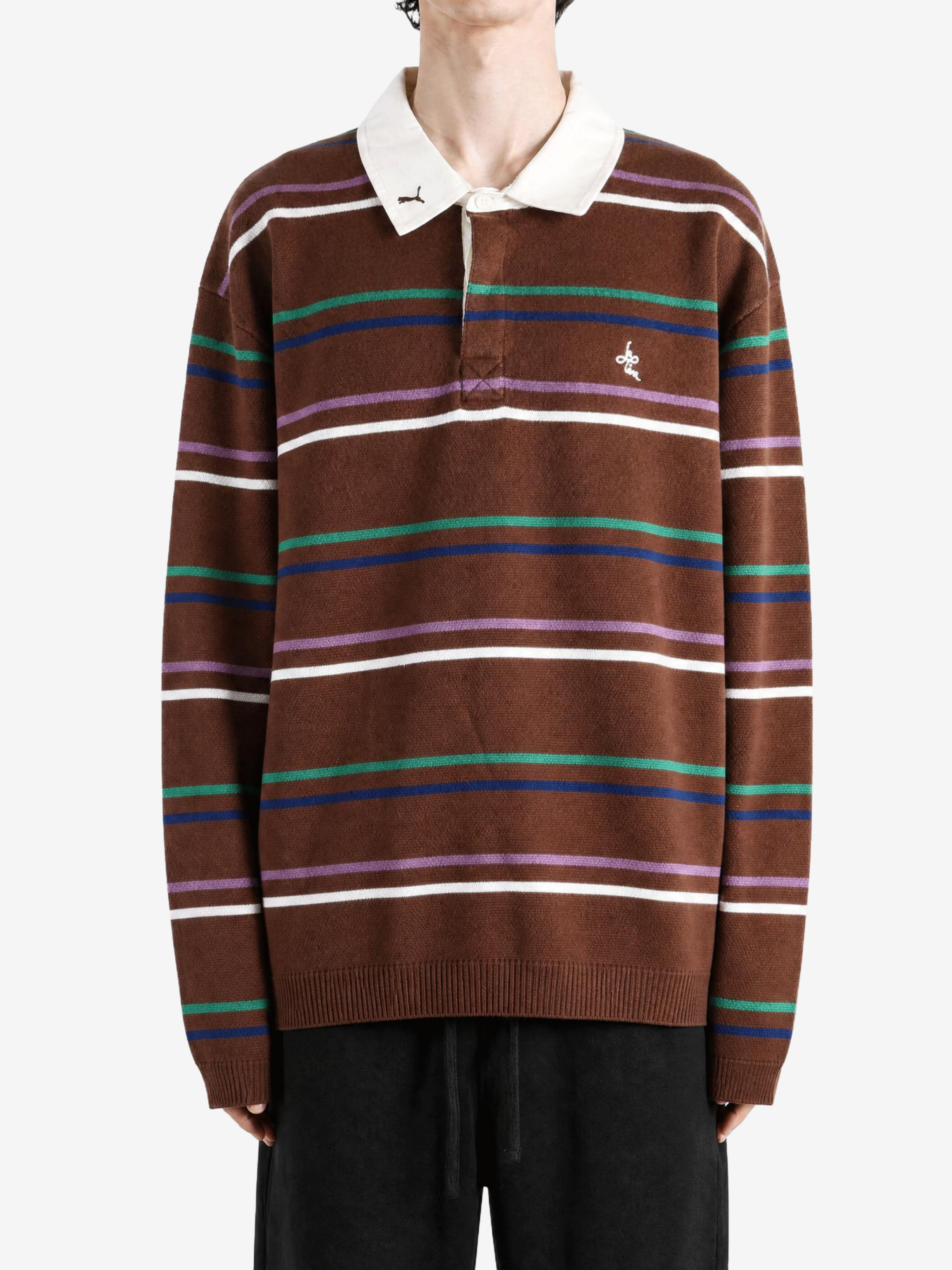 Brown top worn by a person, showing the top fit