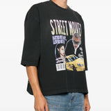 Black t-shirt worn by a person, showing the t-shirt fit