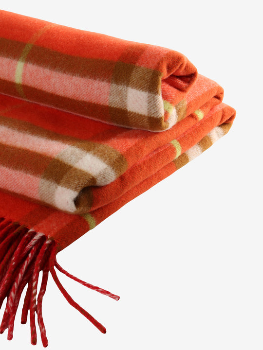 Close up of red scarf, showing texture of the wool fabric