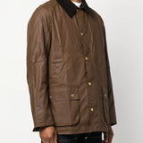 Brown jacket worn by a person, showing the jacket fit