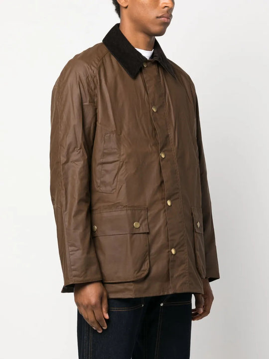 Brown jacket worn by a person, showing the jacket fit