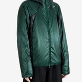 Green jacket worn by a person, showing the jacket fit