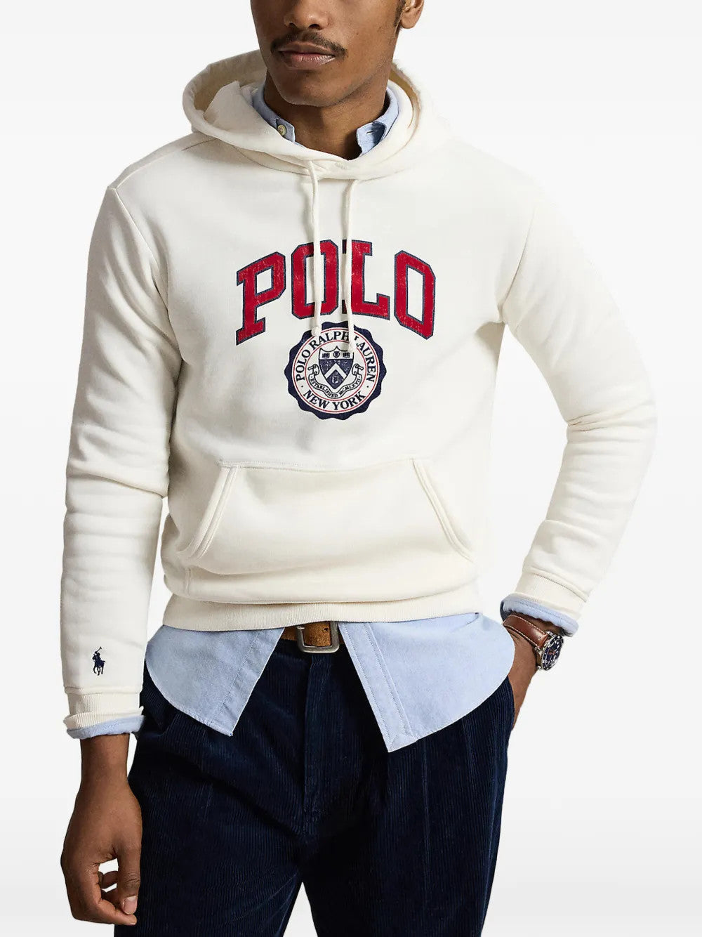 Tan hoodie worn by a person, showing the hoodie fit