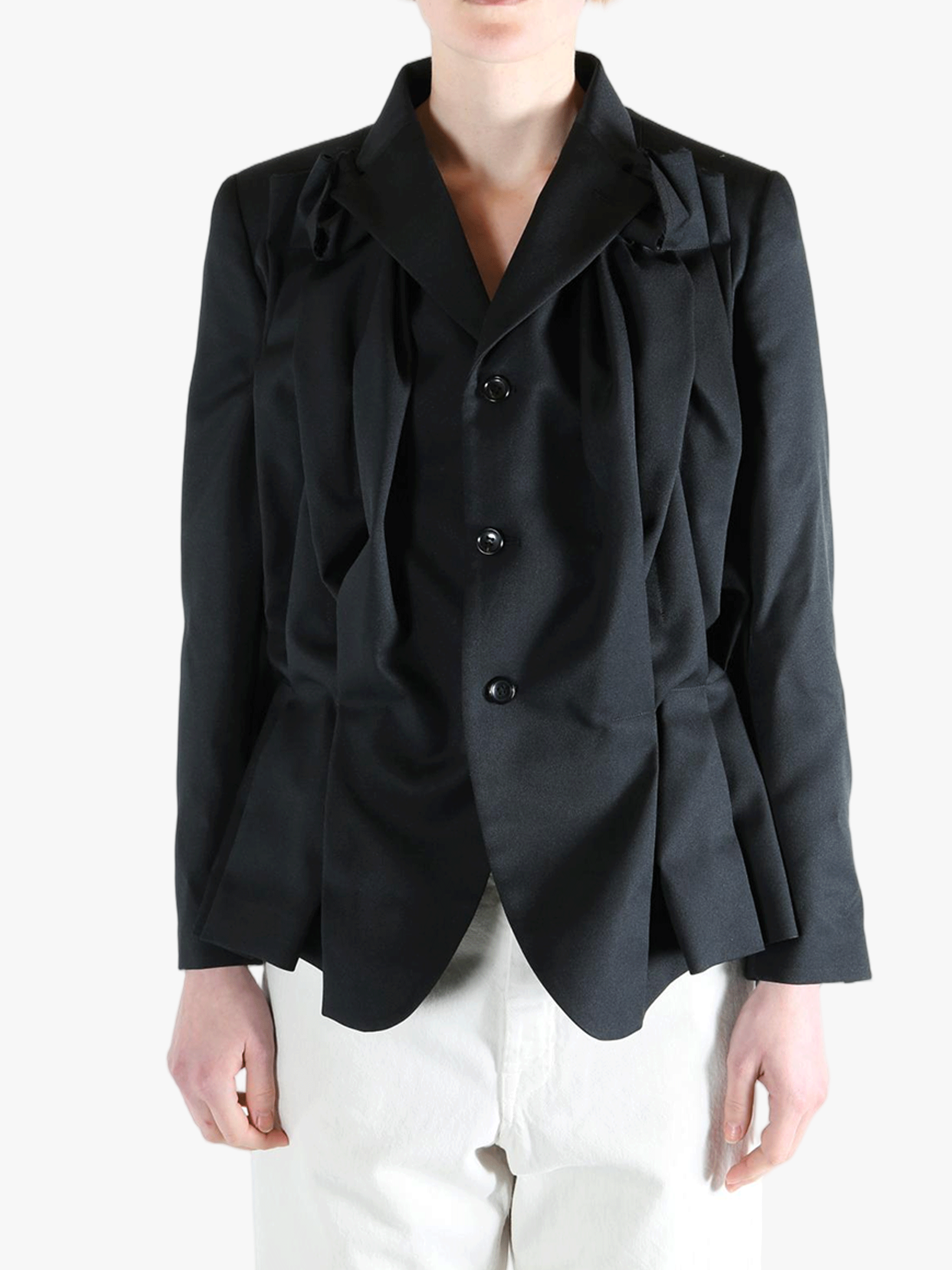 Black jacket worn by a person, showing the jacket's fit