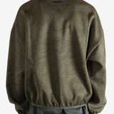 Brown sweatshirt worn by a person, showing the sweatshirt's fit