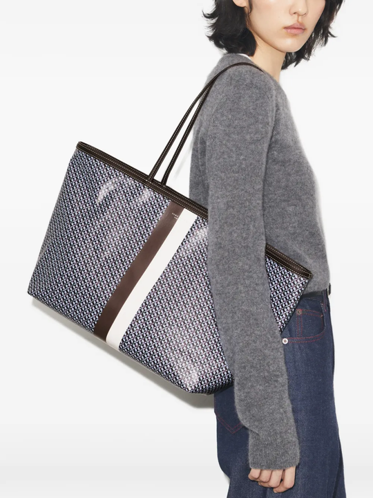 Blue bag worn by a person, showing the bag's fit