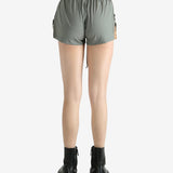 Grey shorts worn by a person, showing the shorts's fit